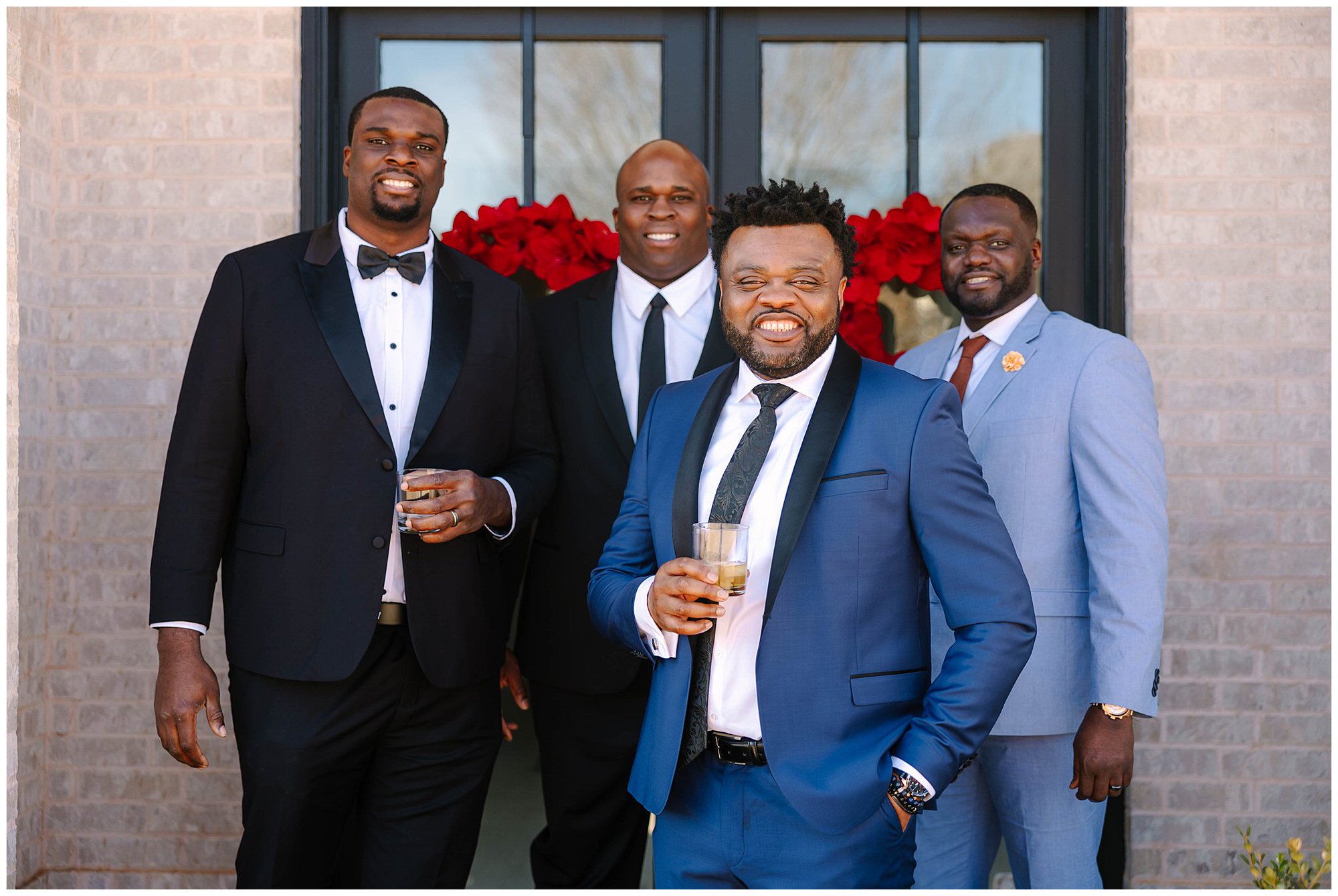 groom and his friends toasting