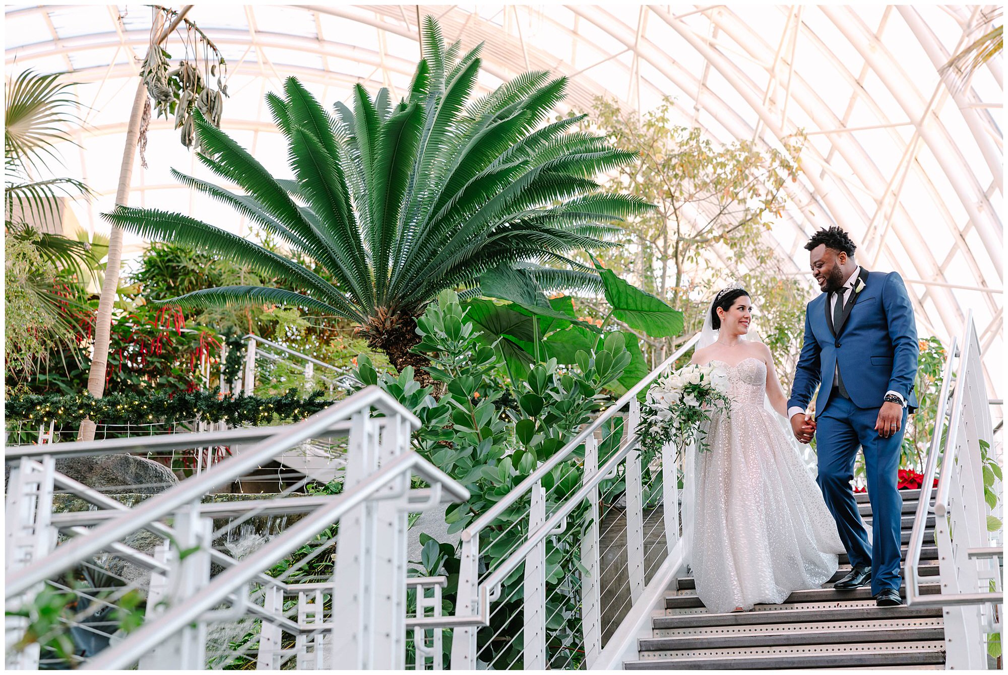 bride and groom walking down staircase at myriad gardens